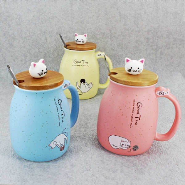 image of three pastel cat ceramic mugs